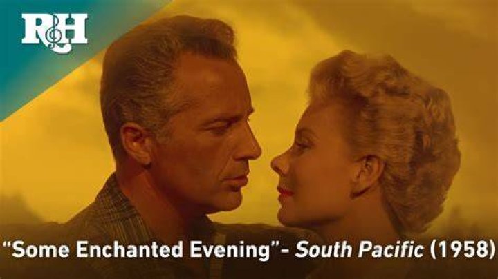 Who sings “Some Enchanted Evening” in “South Pacific” Crossword Clue